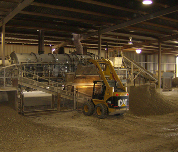 Bentonite being loaded into a dryer